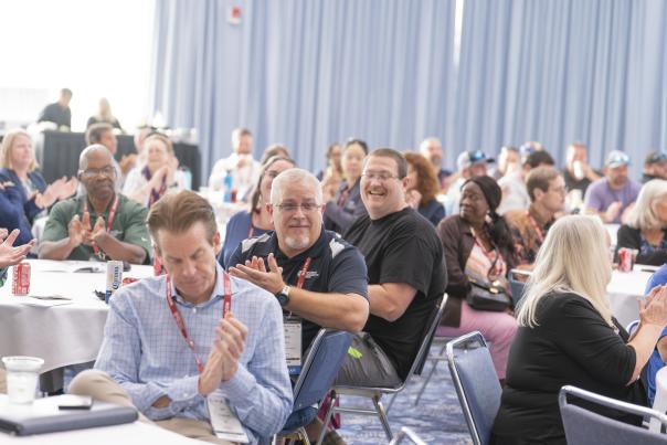 Ballroom meeting clapping - Photo Cred to Laurie Dewitt