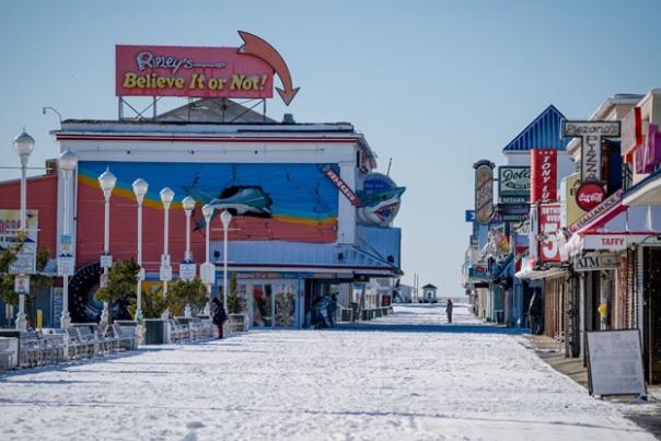 snow on boardwalk winter