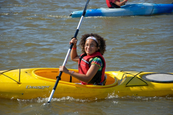 Girl kayaking at Riversport Rapids