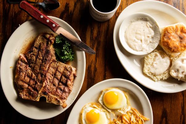 Table full of food at Cattlemen's Steakhouse