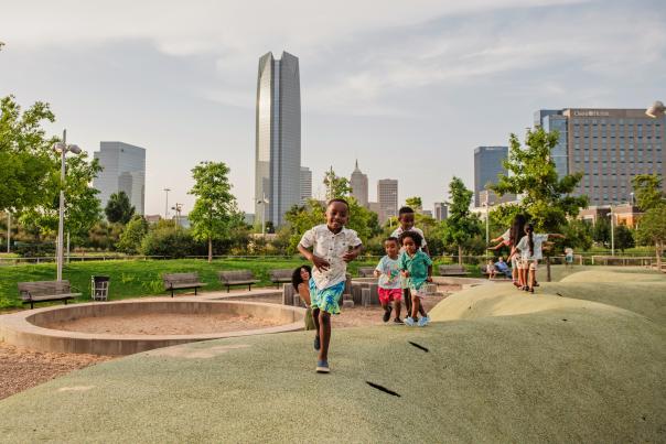 Kids playing at the Scissortail Park Playground