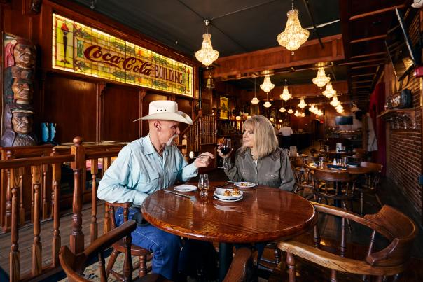 Couple dining at McClintock's Saloon