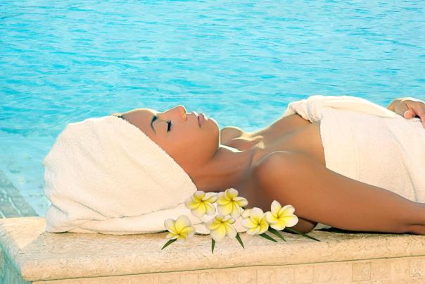 Serenity Spa by Westgate at Westgate Lakes Resort & Spa lady laying by the pool