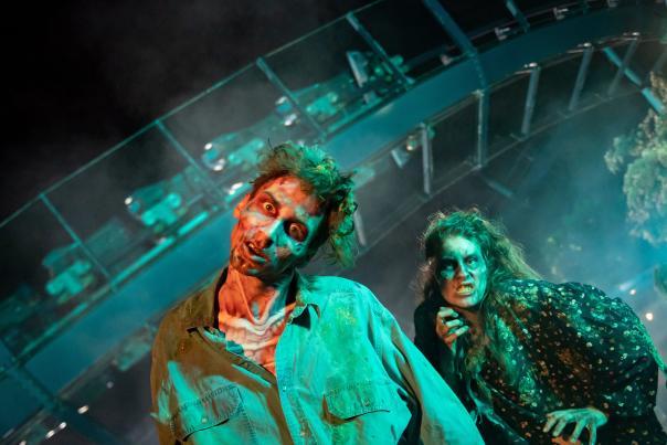 Two people dressed as zombies for SeaWorld's Howl-O-Scream