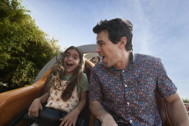 A father and daughter on a Rollercoaster