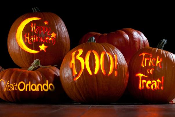 Pumpkins with Visit Orlando logo, Happy Halloween, Boo and Trick or Treat carved on them