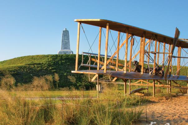 An outdoor display and monument at the Wright Brothers National Memorial in Kitty Hawk, NC.