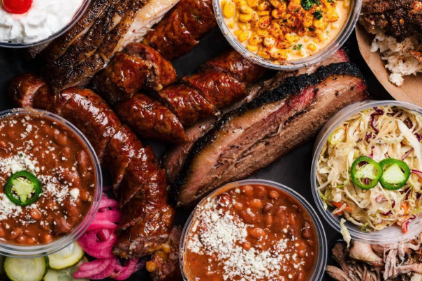 Platter of sides and meats from Harp Barbecue