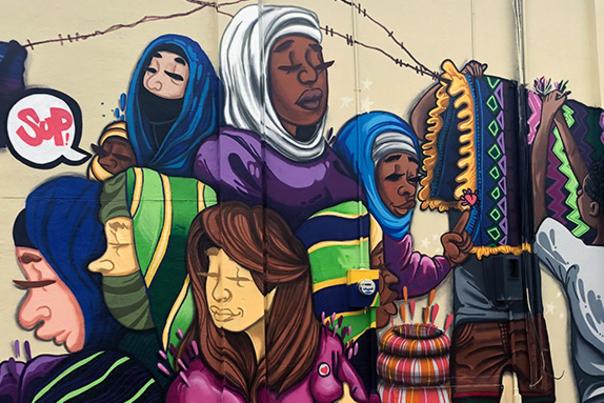 Wall mural of different women and cultures in Overland Park