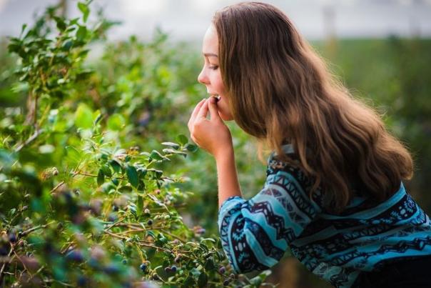 Woman eating berries