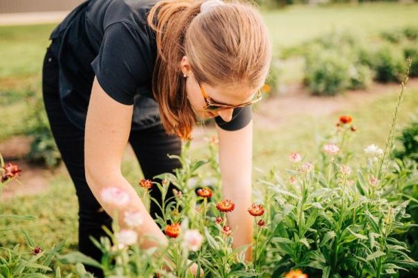 Woman picking flowers