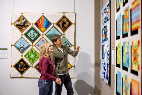 couple exploring the quilt museum