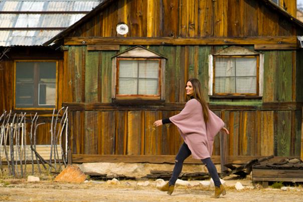 Woman walking through Keys Ranch in Joshua Tree
