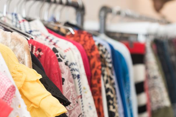 A shot of the clothing racks at Pre Loved Palm Springs