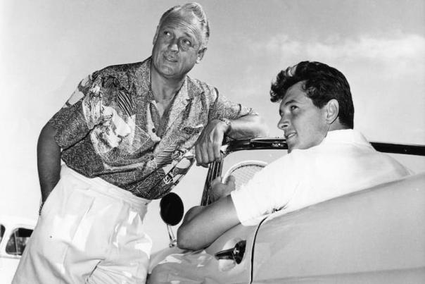 Early image of Rock Hudson in Palm Springs with Charlie Farrel
