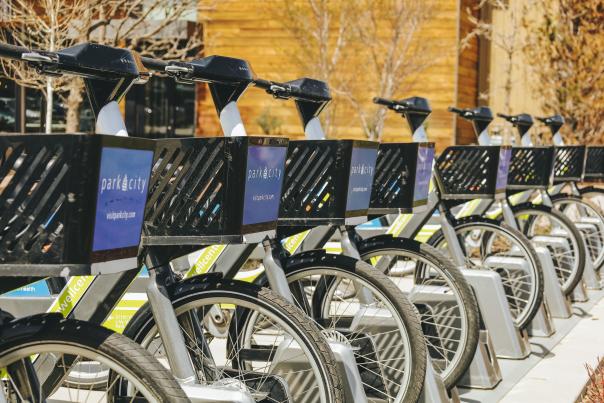 Shot of summit bike share bikes docked and all lined up.