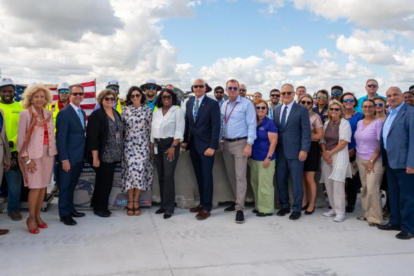 Group of PBI officials and representatives celebrating the Topping Out Ceremony.