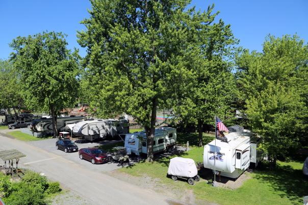 A row of RVs at a campground