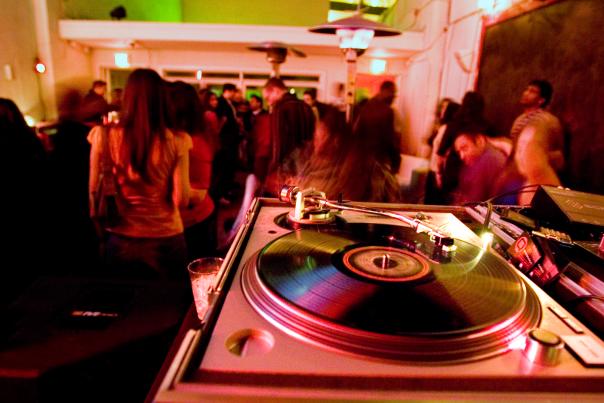 A vinyl record spins at Bar Smith