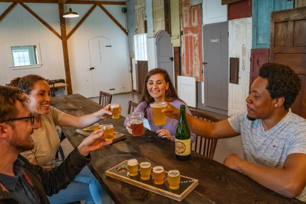 A group enjoys drinks at Second District Brew Farm in the Poconos.