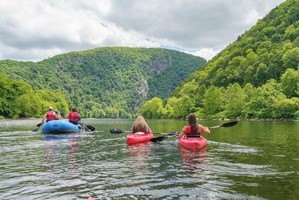 A group of kayakers enjoys a day on the river at Delaware Water Gap in the Poconos.