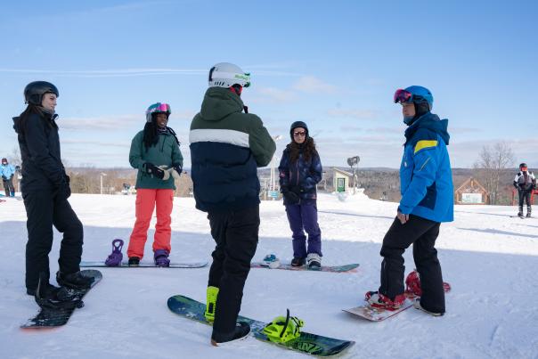 A group of snowboarders prepares for a lesson at Ski Big Bear in the Poconos.