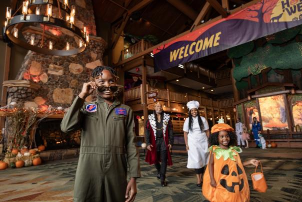 A family gets dressed up in Halloween costumes at Great Wolf Lodge. ESW