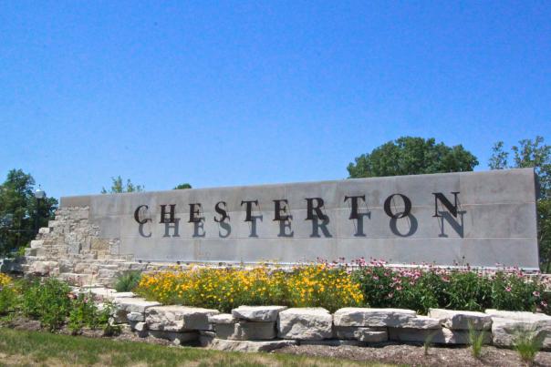 A stone outdoor sign that reads "Chesterton"