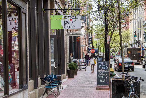 Shoppers stroll past popular boutiques on Westminster Street in Providence
