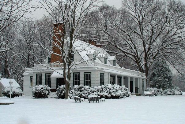 Historic Rippon Lodge and surrounding land covered in fresh snow
