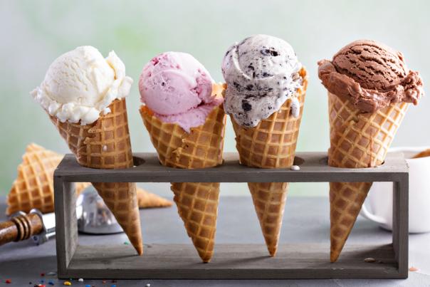 4 ice cream cones in a wooden holder