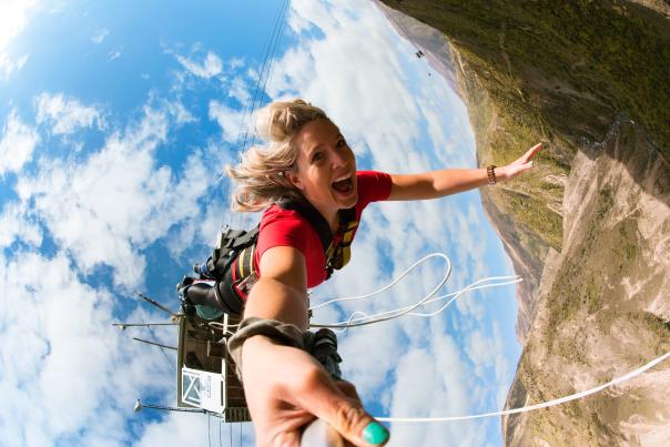 Lady bungy jumping at the Nevis Bungy site, Queenstown