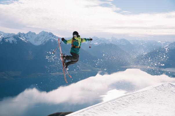 Skiier doing tricks
