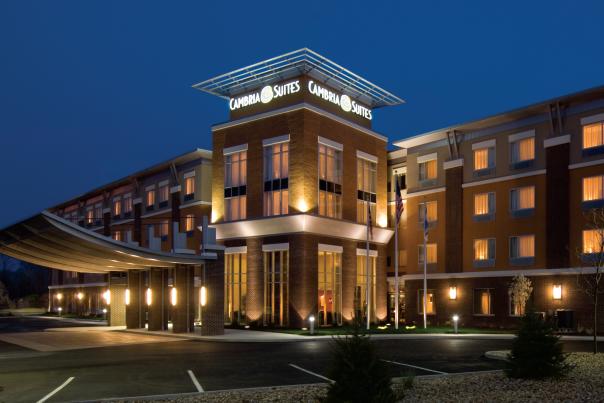 Exterior of the Cambria Suites Hotel in Rapid City, SD at night with lights
