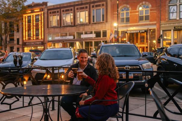 couple enjoying beers on the patio of firehouse brewing company in downtown rapid city south dakota