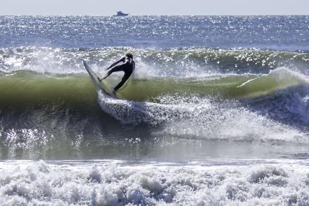 Surfer riding a wave
