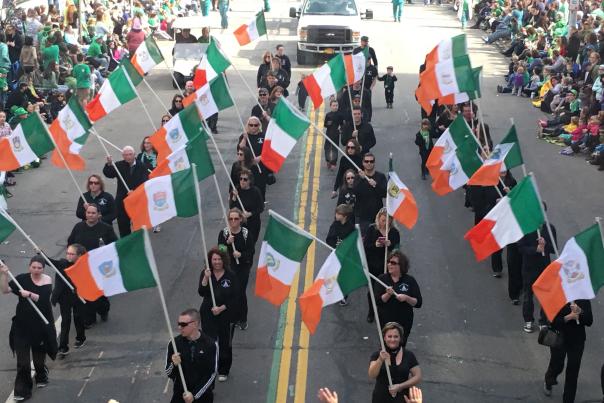 Irish flags waving in the Rochester, NY St. Patrick's Day Parade