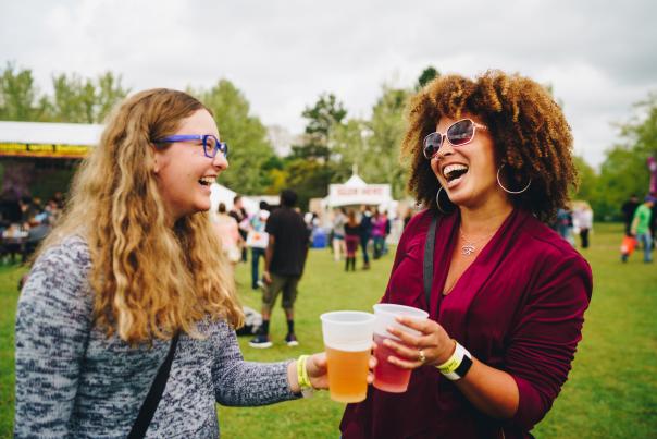 Two Friends Enjoying Libations at Rochester Lilac Festival