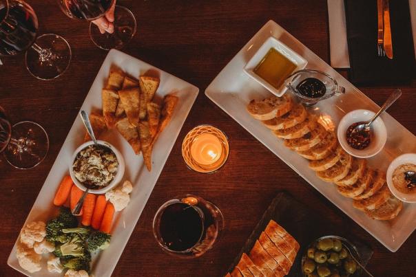 Flight Wine Bar small plates of food and glasses of red wine