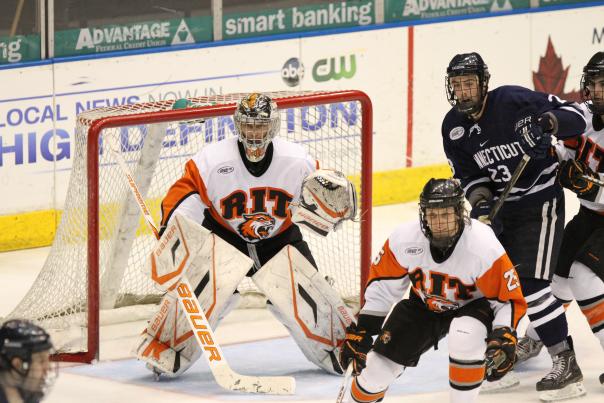 Rochester Institute of Technology hockey goalie defends the goal at championship game
