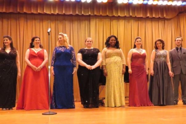 Contestants of Classical Idol in Rochester, Ny stand on stage.