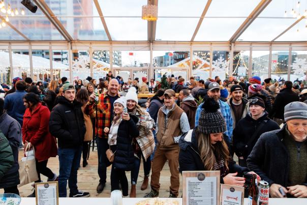 Crowd Standing at the Bar in the Roc Holiday Village Lodge