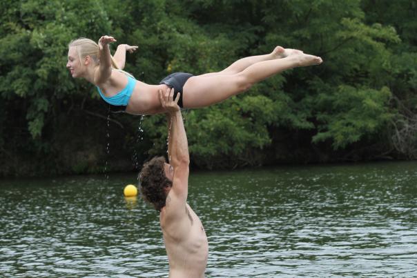 A couple reenacts a famous scene from Dirty Dancing in the waters of Lake Lure, NC.