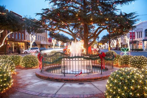 The downtown water fountain brilliantly decorated with wreathes and light displays in Forest City, NC.