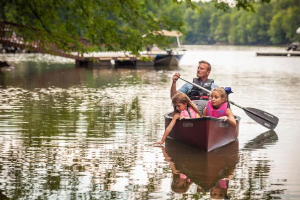 Dad and girls in boat