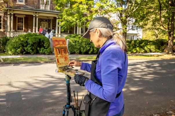 Woman painting at OctoberTour