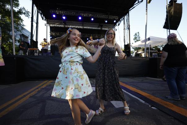 The crowd dances to a performance