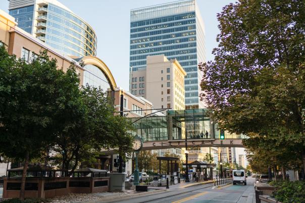 View looking south on main street in Salt Lake in summer time showing the street bridge at City Creek Center
