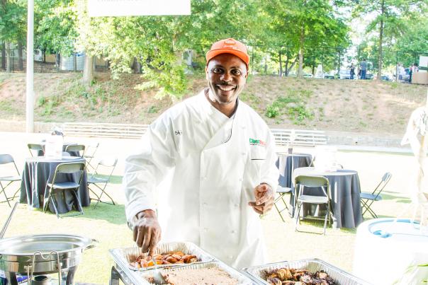 Chef Rob serving up caribbean cuisine at Food That Rocks in Sandy Springs