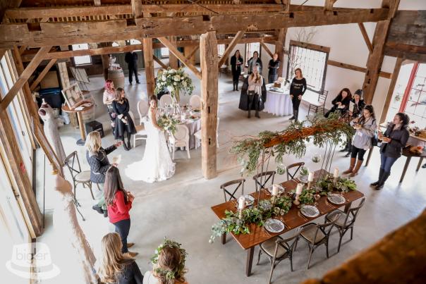 People viewing the inside of the barn